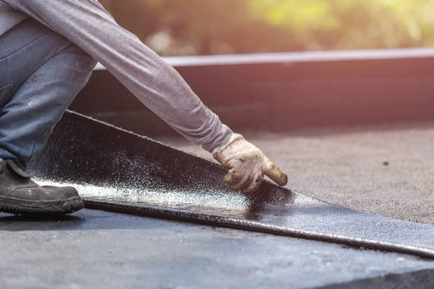 Professional Basement Waterproofing technician working in Byron, MN